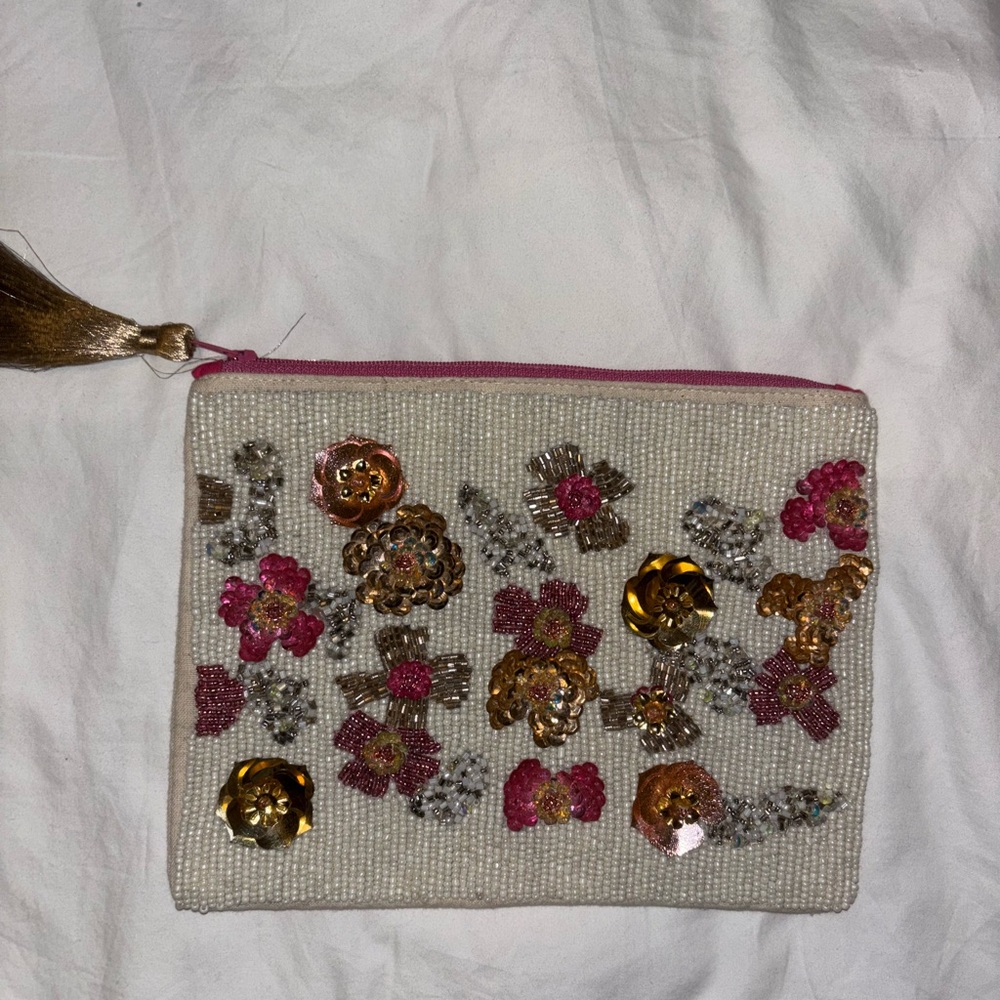 Embellished Cream Bag with Pink and Gold Accents